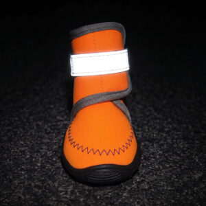 All-Weather Protective Boots High Visibility Night Safety Strap Wide silver gray panels glowing bright on all-weather protective boots under dark environment conditions for safety.