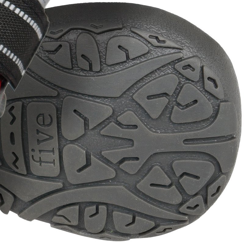 Underneath view of anti-slip dog shoes with rubber sole showcasing the deep geometric block treads and molded sizing markers.