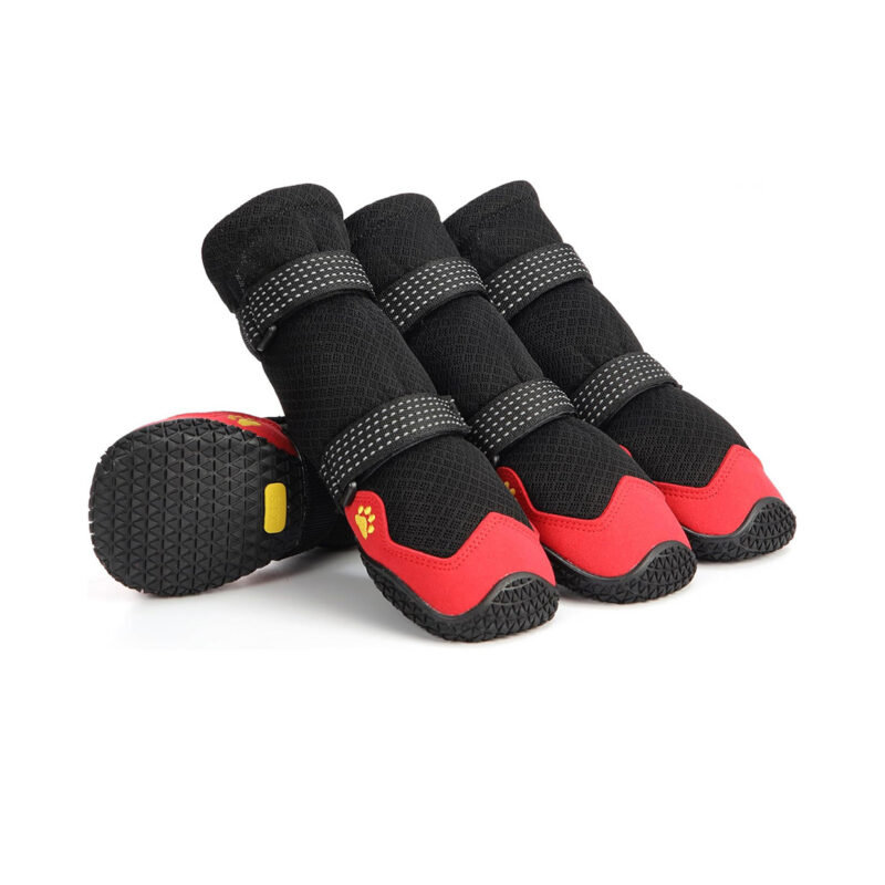 Black and Red Protective Hiking Dog Boots with High-visibility Reflective Straps Anti-slip outdoor dog boots in black and red showing flexible rubber outsoles for large dogs.