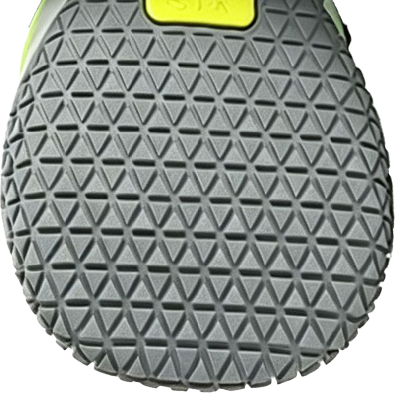 Heavy-duty grey rubber outsole on anti-slip rubber sole boots displaying multi-terrain traction grooved grids.