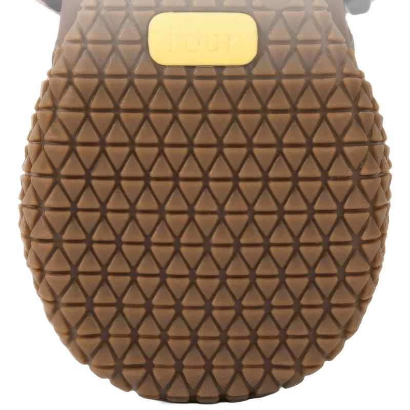Puncture-resistant brown rubber tread on anti-slip rubber sole boots displaying automotive tire pattern textures.