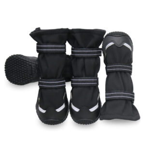 Anti-Slip Rubber Sole Boots Dense Tread Detail Detailed tread matrix on anti-slip rubber sole boots alongside black fleece lined winter booties on a white background.