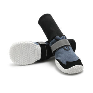 Anti-slip rubber sole boots in denim blue displaying the dense triangular traction grid on the white base.