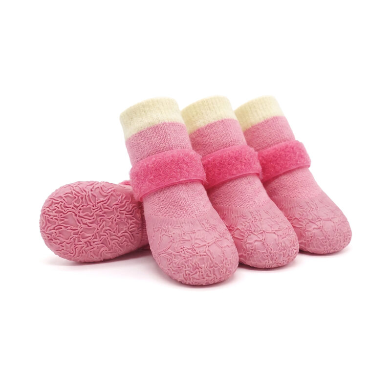 Sakura pink anti-slip textured dog socks with flexible waterproof pink rubber soles for small to large dogs.