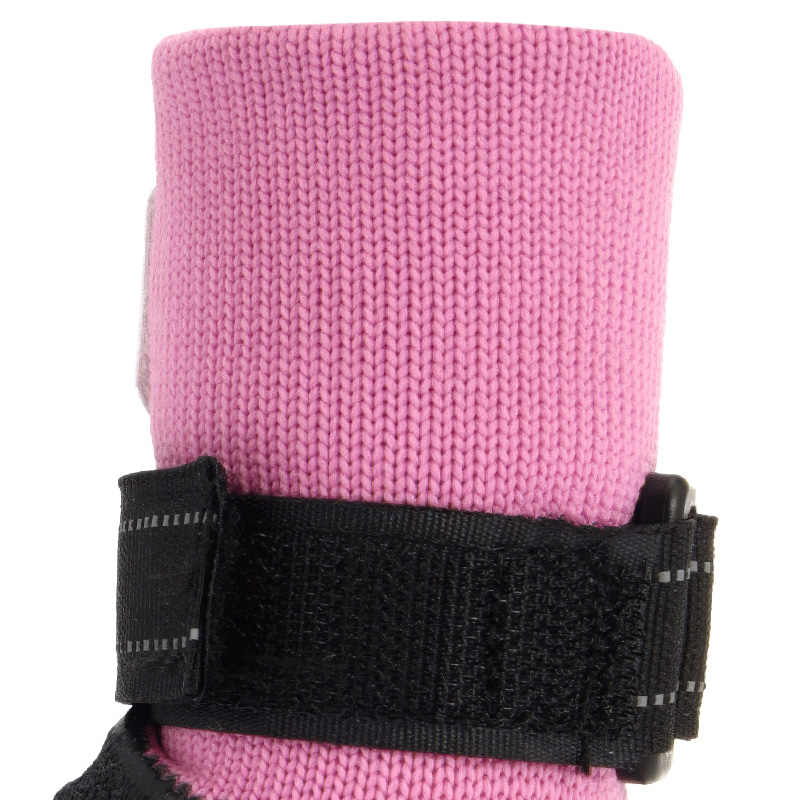 Rear close-up of breathable knit dog booties showing the heavy-duty micro-hook velcro anchoring strap mechanics.