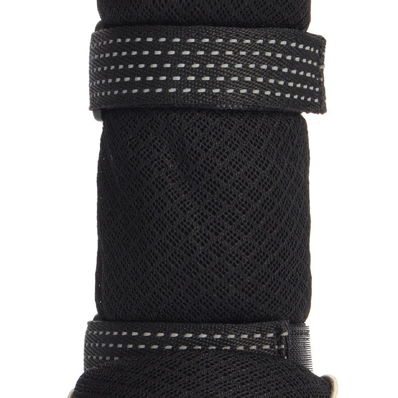 Detailed front view of breathable mesh dog boots showcasing dual secure hook-and-loop closure bands.