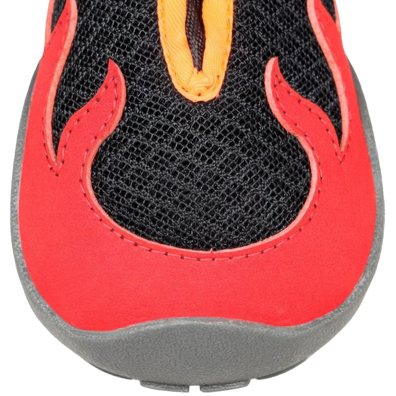 Macro view of breathable mesh dog shoes highlighting the open triple layer sandwich knit fabric and crimson red flame trim.