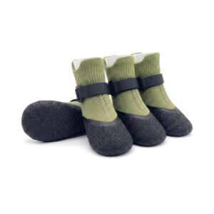Sage green washable mesh dog booties featuring protective black latex bases and adjustable square buckles.