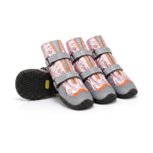 Cold Weather Dog Boots Coral Pink Overview Cold-weather dog boots in coral pink displaying high-top quilted shafts and secure grey double adjustment straps.