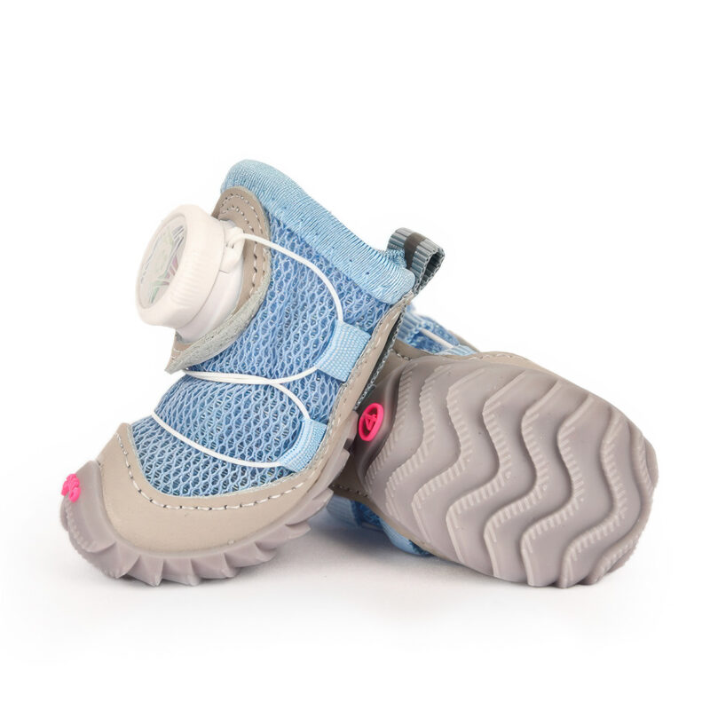 Denim Blue Comfort Fit Soft-Sole Dog Shoe Tread Front view next to the underfoot traction grid of denim blue comfort fit soft-sole dog shoes with gray soles.