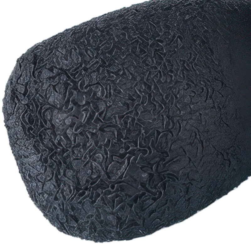 Super macro texture view showcasing the high-friction vulcanized tread on crinkle rubber bottom socks.