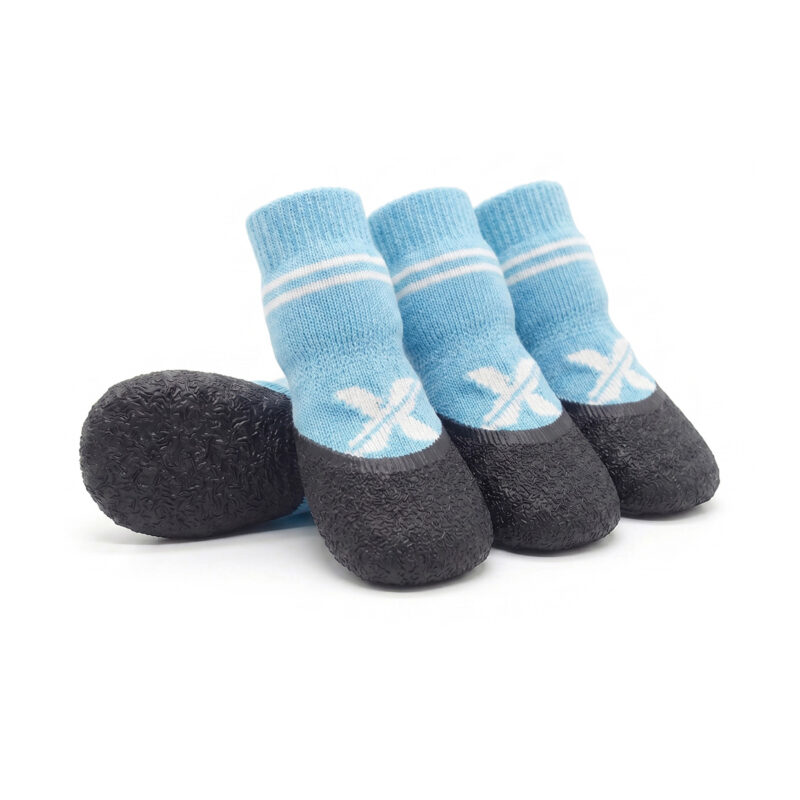 Sky blue crinkle sole knit dog booties showcasing athletic white stripes and a high-grip dipped rubber base.