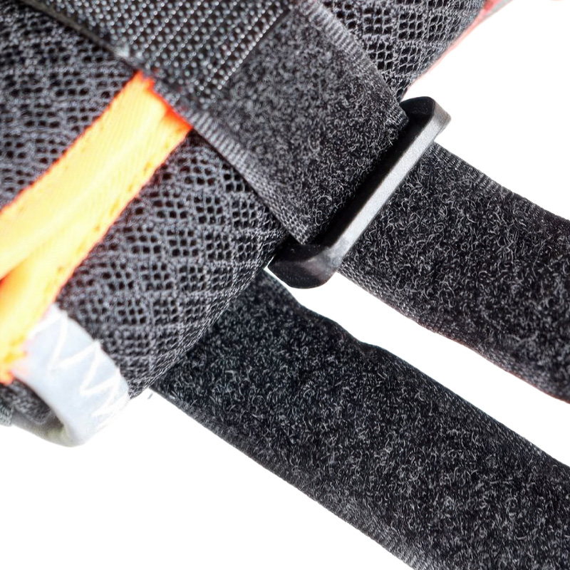 Technical close up of dog shoes that stay-on showcasing the high shear double Velcro straps fed through a plastic guide buckle.