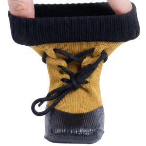 Hands stretching the high-elastic ankle cuff of camel tan drawstring knit dog booties to show elasticity.