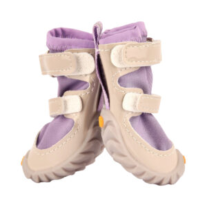 Close up view of easy-on-off dog shoes in taro purple showcasing the reflective silver lines and wide gusset opening.