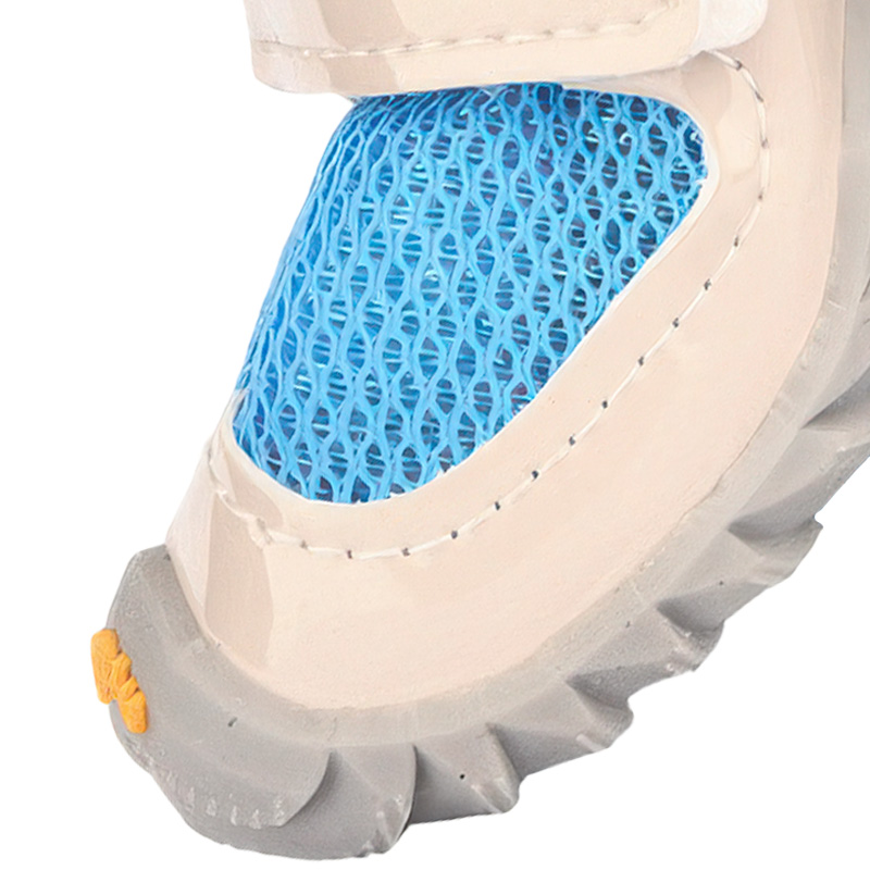 Front angle view of easy-on-off dog shoes highlighting the impact resistant rubber bumper and breathable tongue structure.