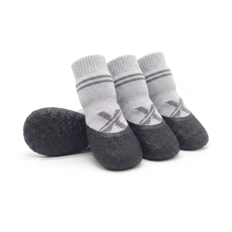 Silver gray elastic cuff puppy socks showing a high-resilience compression sleeve and textured non-slip rubber bottom.