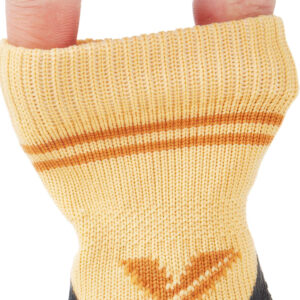Close-up view of fingers stretching the durable elastic cuff puppy socks collar to demonstrate high textile elasticity.