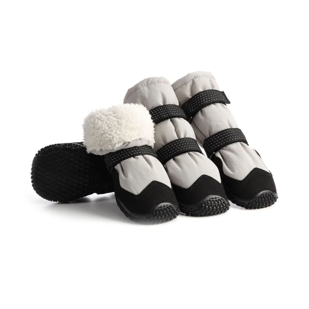 Fleece-lined dog boots in silver gray showing four winter booties with thick white plush lining and black rubber outsoles.