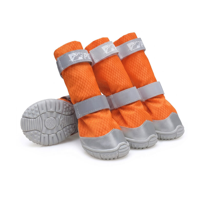Flexible rubber sole boots in tangerine orange displaying secure double wrap straps and reinforced gray toe caps.