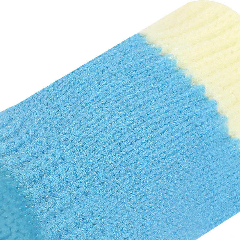 Extreme macro view of the specialized interlocking yarns on flyknit breathable dog socks for open ventilation.