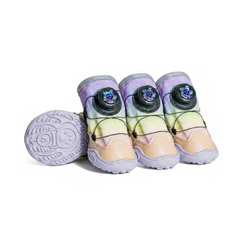 Unicorn pink gradient dial-fit dog shoes showing the mechanical cable wheel and light lavender non slip rubber soles.