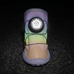 Dark Room Photo Luminescent Luminous Fabric Visibility Test Gradient dial-fit dog shoes in darkness emitting a high visibility bright neon glow around the central dial frame.