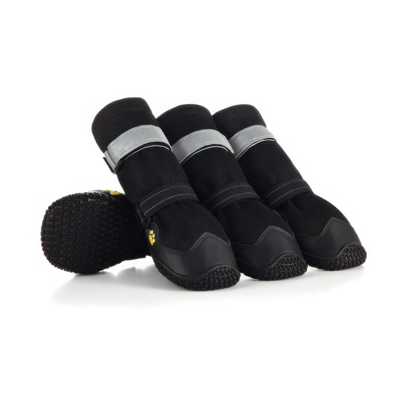 Four stealth black high-top dog boots featuring easy on-off reflective straps and a durable, anti-slip rubber tread sole, isolated on white.