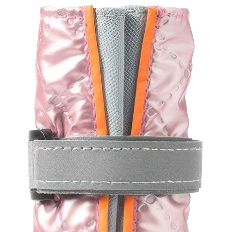 High-top snow boots showing the expanded V-shaped gusset throat and secondary gray reflective strap interface.