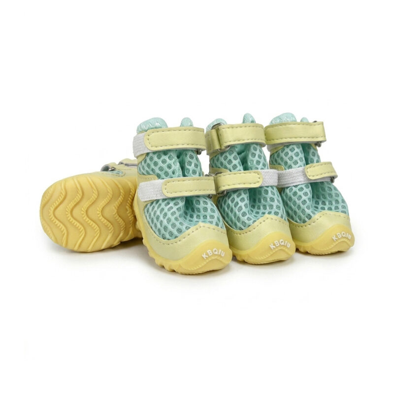 Sage Green Canine Footwear High Airflow Summer Model Sage green honeycomb mesh dog shoes showcasing the double Velcro anchoring bands and anti slip light yellow outsoles.