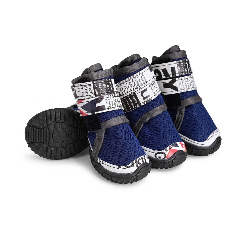 Royal blue and dark blue large breed dog shoes showing text print wrap straps and black non slip rubber soles.
