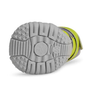 High Friction Vulcanized Rubber Sole Anti Slip Tread Geometry Underneath view of large breed dog shoes outsole detailing the centered paw icon track and anti slip cross blocks.
