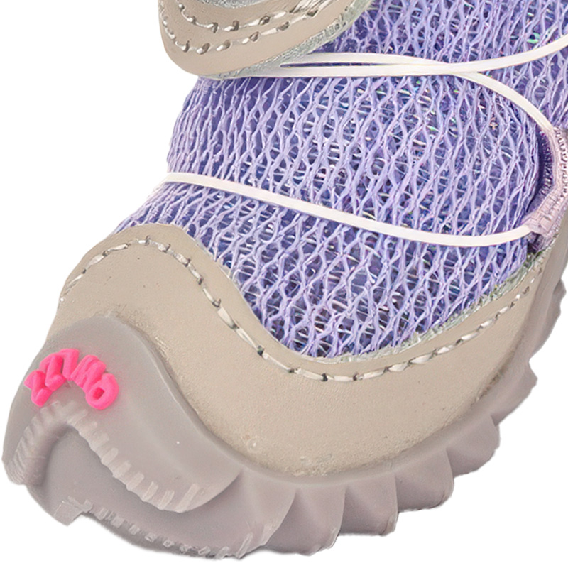 Close up look at the gray faux leather mudguard boundary and porous purple diamond lattice upper on a puppy bootie.