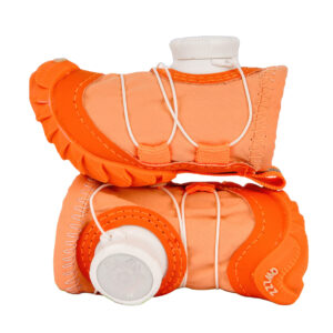 Lateral profile look at two stacked tangerine orange lightweight soft-sole paw protectors showing the white cable routing paths.