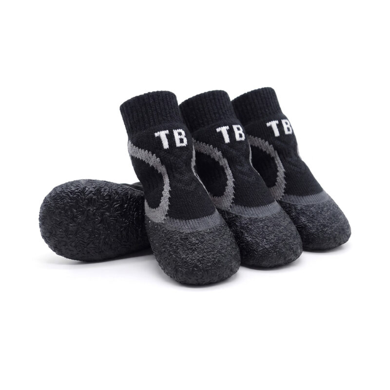 Stealth black no-slip stay-on dog socks featuring dark gray side stripes and a high-friction protective rubber floor.