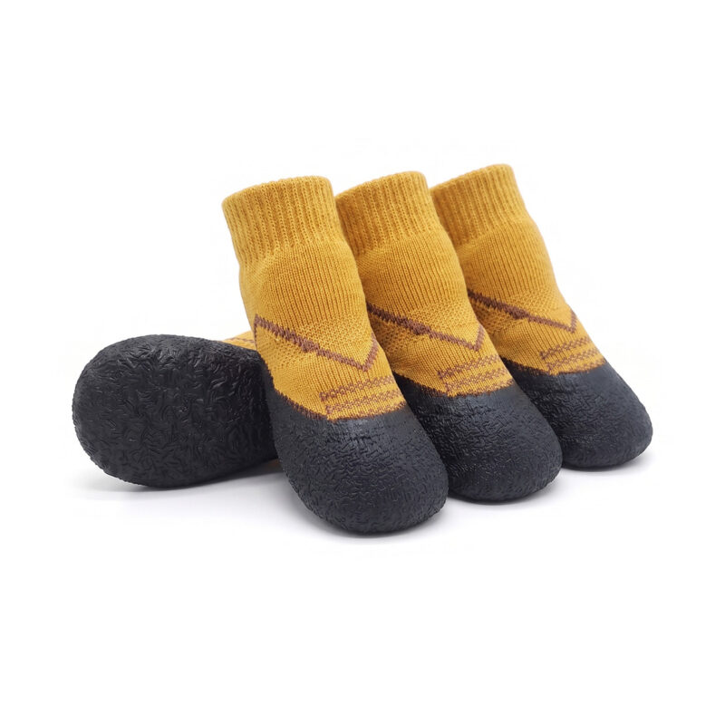 Camel tan nonslip walking dog socks presenting dark brown graphic accents and a high-traction vulcanized base.