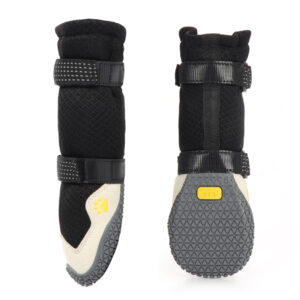 Heavy-duty Rubber Outsoles for Maximum Traction on Rough Outdoor Hiking Trails Soft sole dog boots for walking displaying deep triangular anti-slip grooves on the rubber base.