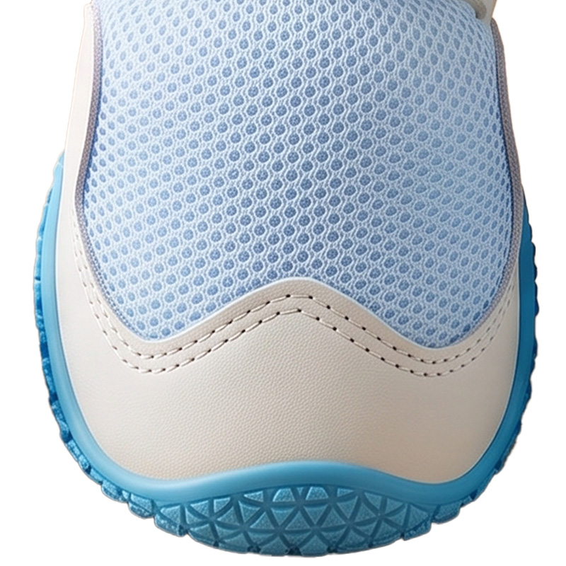 Integrated anti-collision toe cap on protective walking dog boots showing heavy-duty stitched wrapping.