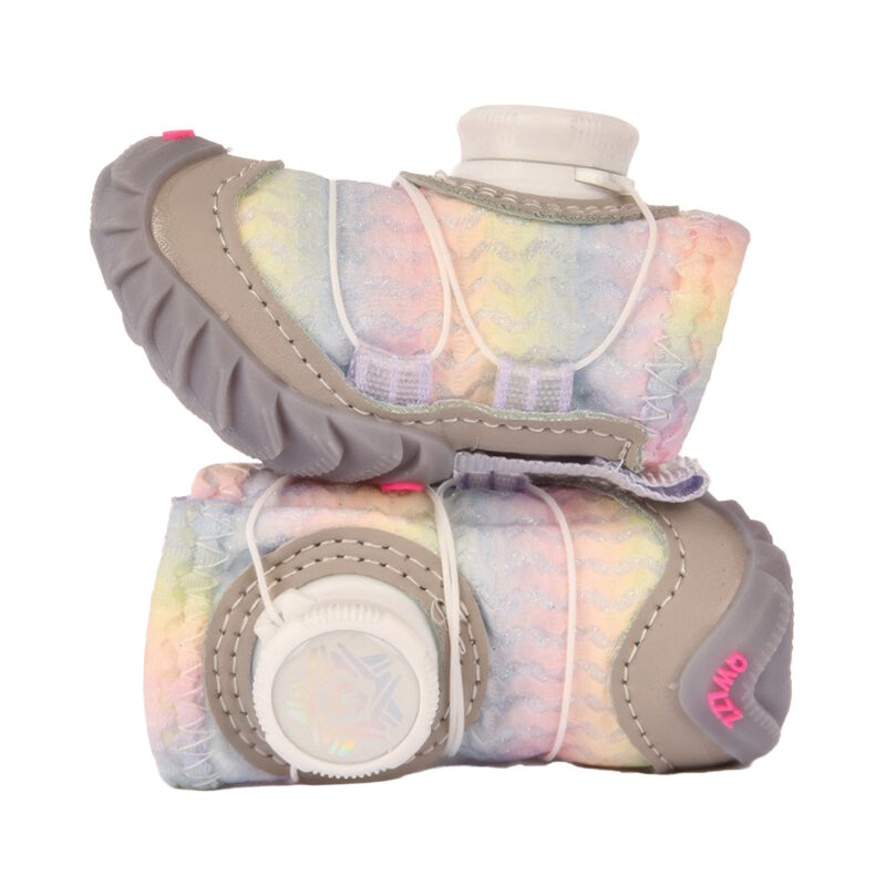 Side profile comparison of a pair of unicorn pink rainbow glow dial-fit dog shoes illustrating the soft fabric uppers.