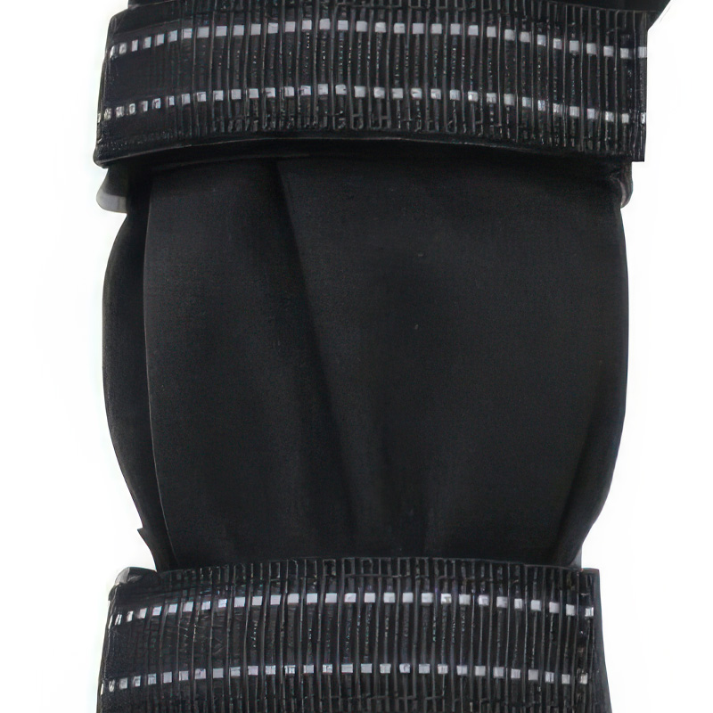 Dual hook-and-loop wrap straps on rainy day dog boots with straps showing reflective safety stitching.
