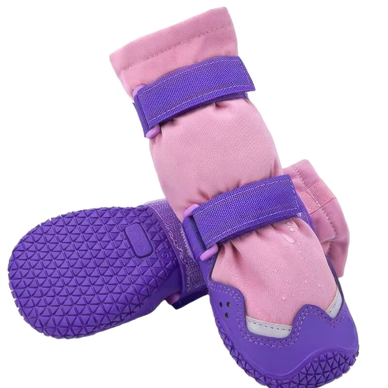 Rainy Day Dog Boots With Straps Water Repellent Test Close-up of rainy day dog boots with straps showing water droplets deflecting off the purple weatherproof outer fabric.