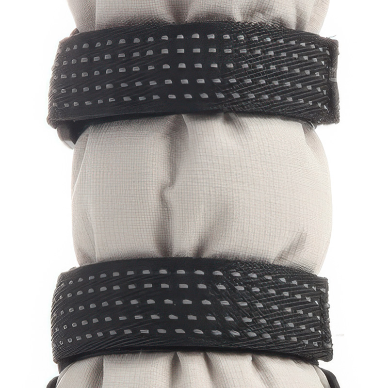 Close-up of the high-adhesion magic hook-and-loop closure on reflective double-strap shoes for winter stabilization.