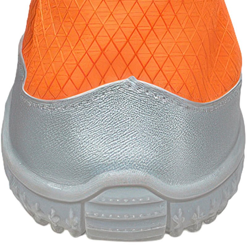 Silver scalloped front bumper on reinforced toe dog shoes protecting front claws from rock trailing impacts.