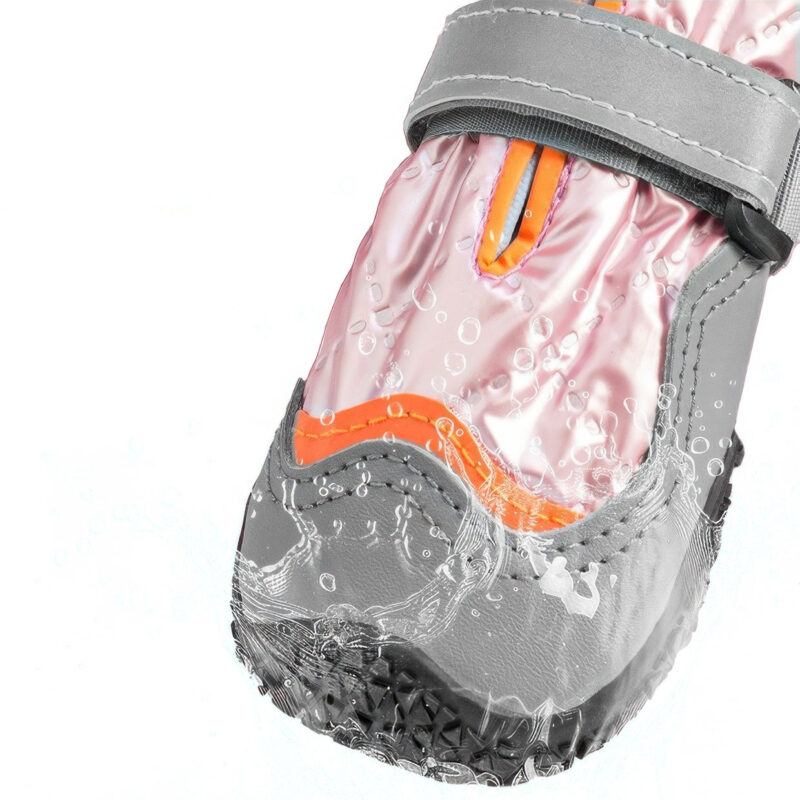 Salt Resistant Dog Boots Waterproof Membrane Proofing Hydrophobic test on salt-resistant dog boots showing water stream beads repelling smoothly off the pink quilted canopy.