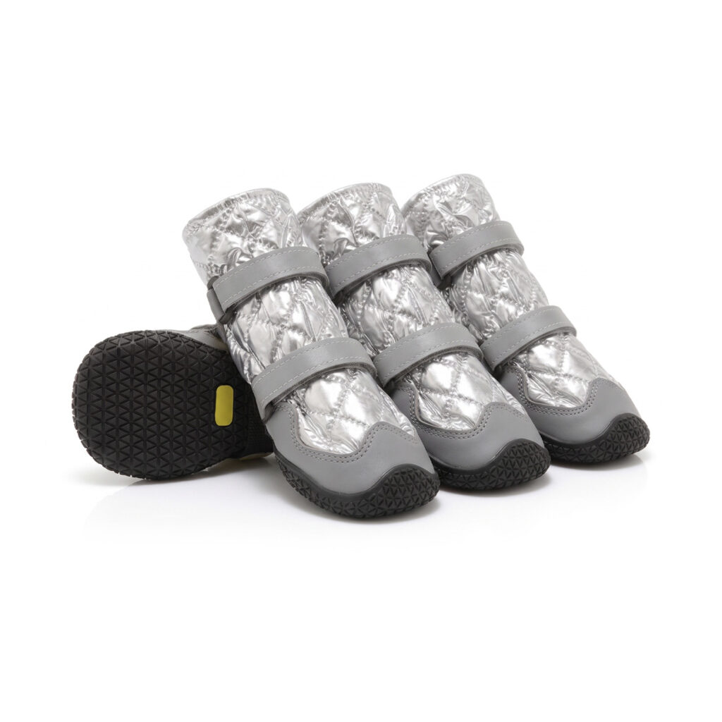 Snow waterproof dog boots in silver gray showing four structured quilted winter booties with black non-slip soles.