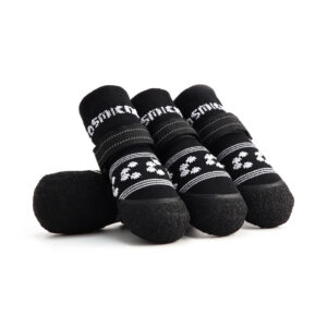Stealth black soft-sole dog socks with white pattern detailing and reflective secure-fit velcro straps.