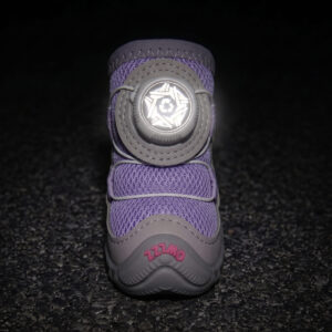 High Visibility Night Safety Reflective Dial Glow Front view of a purple sparkly mesh dog shoe with its white central wire dial glowing brightly under low-light flash parameters.