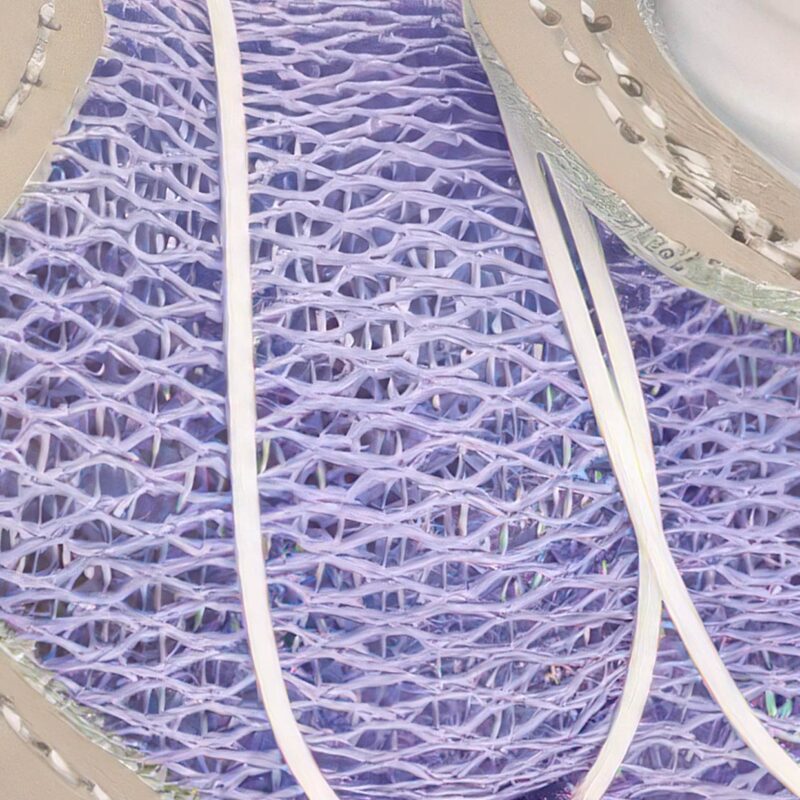 Sparkly Mesh Dog Shoes Fabric Texture Close-Up Close macro view focusing on the shimmering light-reflective sequin threads inside purple sparkly mesh dog shoes.