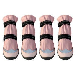 Stay-On Winter Dog Boots Blush Pink Lineup Four stay-on winter dog boots in blush pink featuring long sleeve shafts and reflective gray protective toe caps.