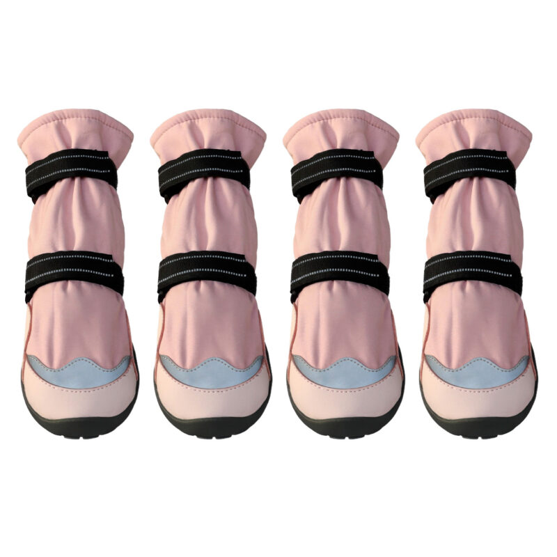 Stay-On Winter Dog Boots Blush Pink Lineup Four stay-on winter dog boots in blush pink featuring long sleeve shafts and reflective gray protective toe caps.